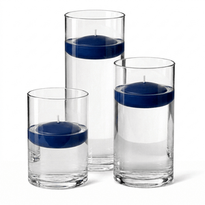 9 of 14: Cylinder Vase Centerpiece & Richland 3" Floating Candles Set of 18