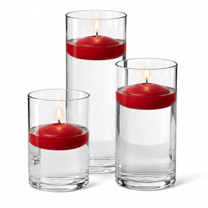 13 of 14: Cylinder Vase Centerpiece & Richland 3" Floating Candles Set of 18