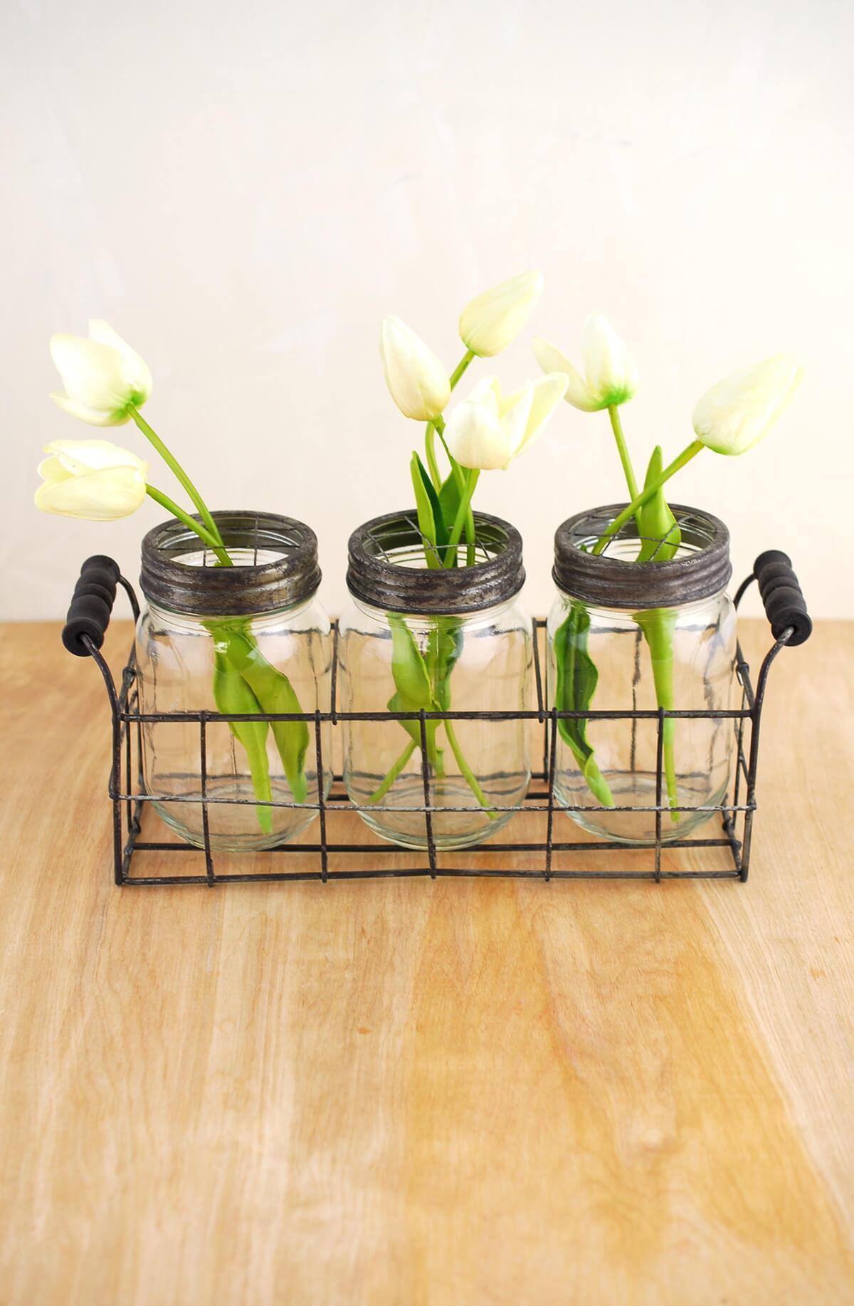 wire basket with 3 glass mason jars with frog lids - view 3