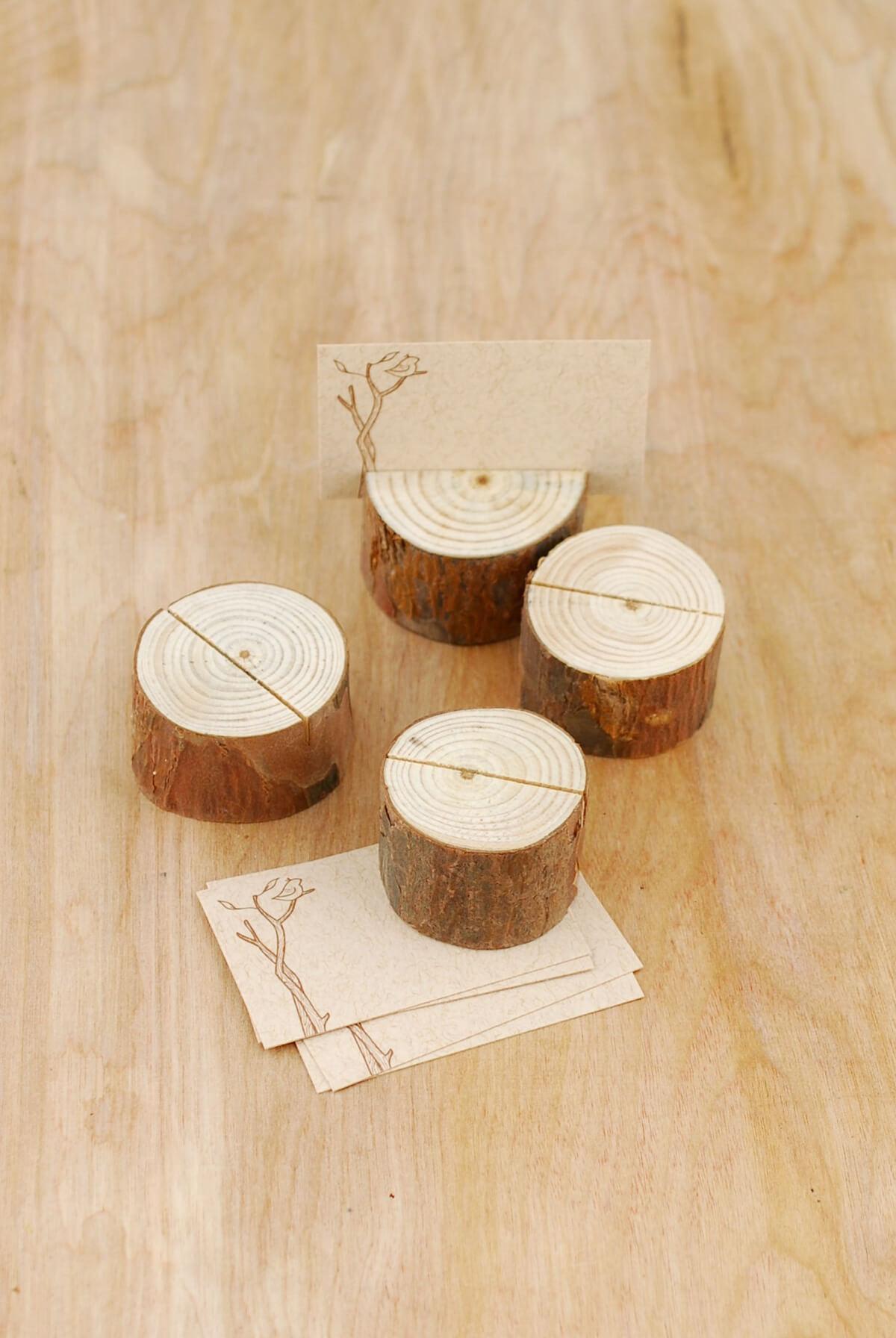 4 tree branch place card holders with cards